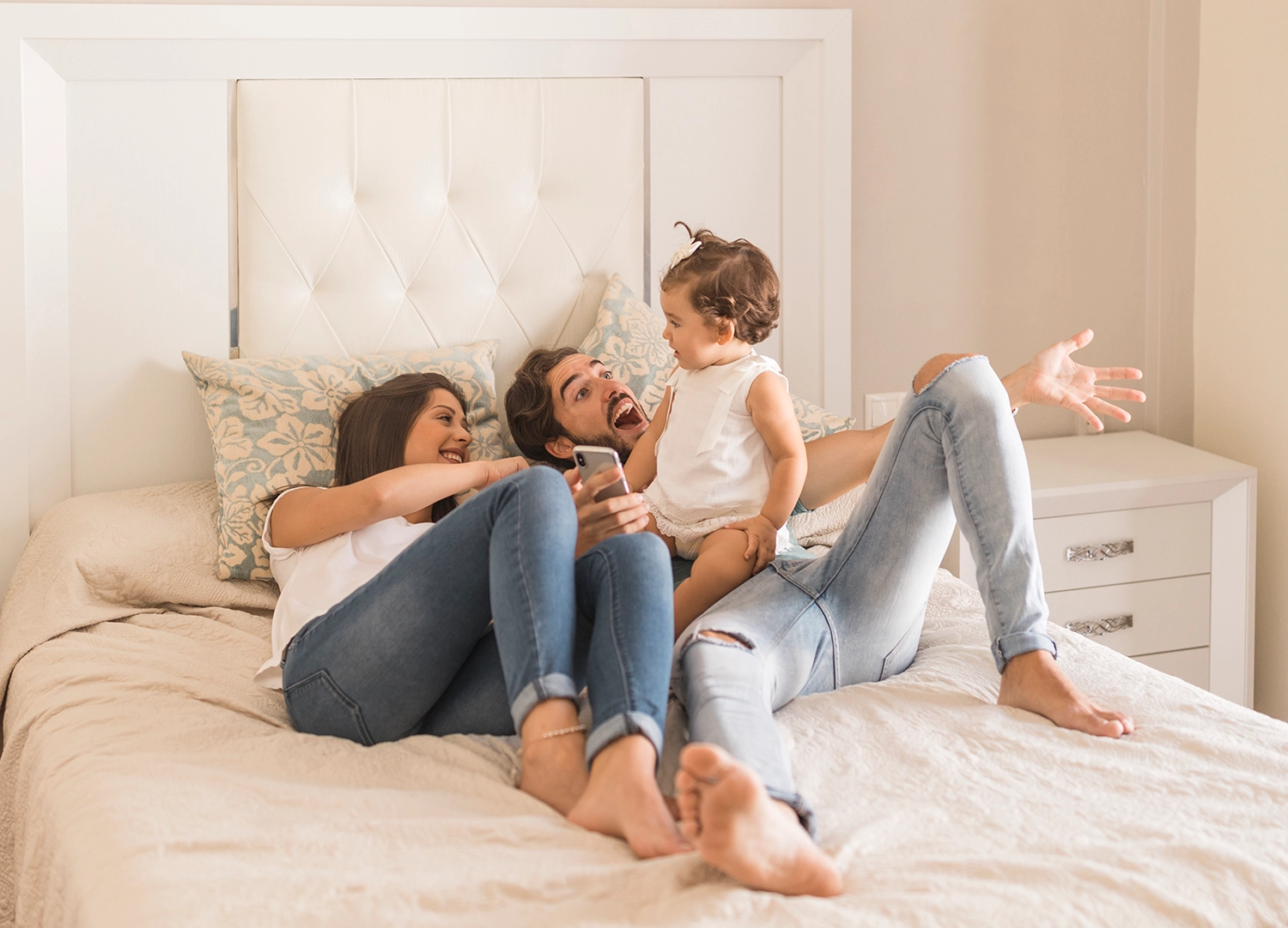 young-couple-with-baby-bed